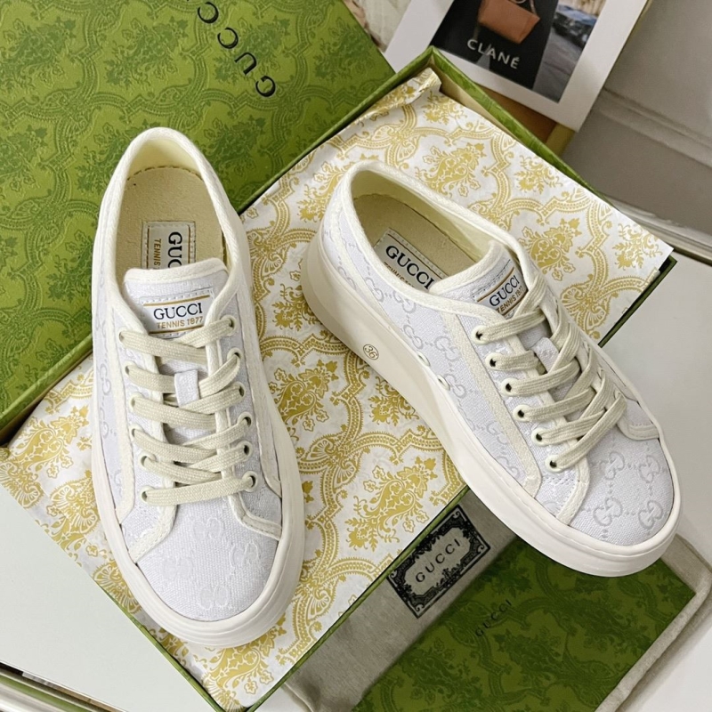 G*u*i sneakers